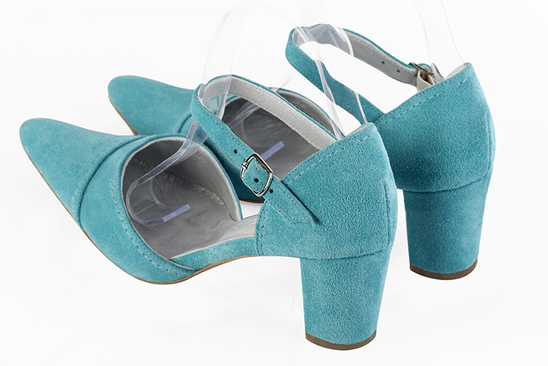 Chaussure femme à brides : Chaussure côtés ouverts bride cou-de-pied couleur bleu lagon. Bout effilé. Talon mi-haut bottier. Vue arrière - Florence KOOIJMAN
