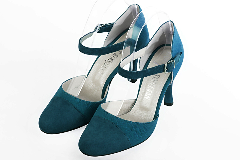Chaussure femme à brides : Chaussure côtés ouverts bride cou-de-pied couleur bleu canard. Bout rond. Talon très haut fin Vue avant - Florence KOOIJMAN