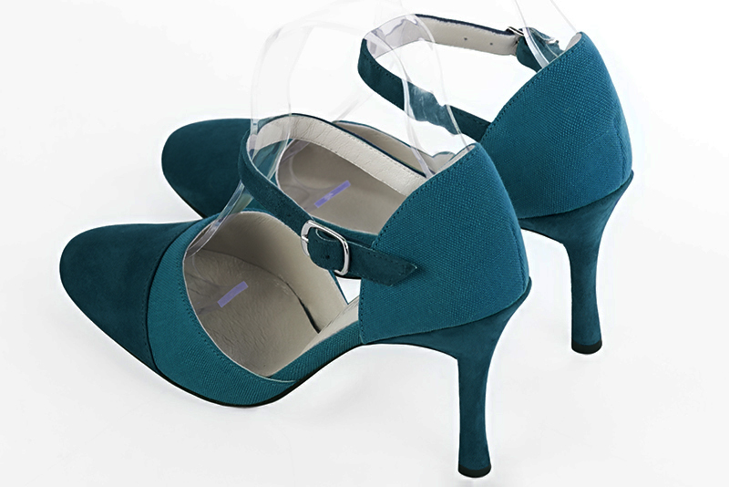 Chaussure femme à brides : Chaussure côtés ouverts bride cou-de-pied couleur bleu canard. Bout rond. Talon très haut fin. Vue arrière - Florence KOOIJMAN