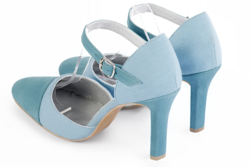 Chaussure femme à brides : Chaussure côtés ouverts bride cou-de-pied couleur bleu ciel. Bout rond. Talon très haut fin. Vue arrière - Florence KOOIJMAN