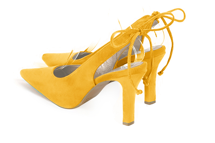 Chaussure femme à brides :  couleur jaune soleil. Bout pointu. Talon haut fin. Vue arrière - Florence KOOIJMAN