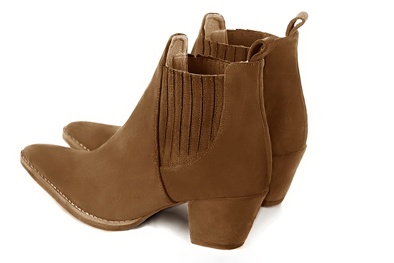 Boots femme : Boots élastiques sur les côtés couleur marron caramel. Bout effilé. Talon mi-haut conique. Vue arrière - Florence KOOIJMAN