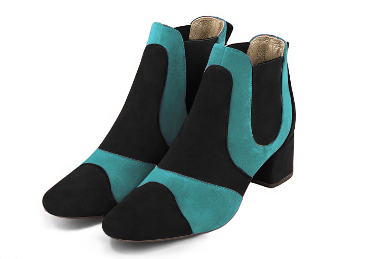 Boots femme : Boots bicolores élastiques sur les côtés couleur noir mat et bleu lagon. Bout rond. Petit talon évasé Vue avant - Florence KOOIJMAN