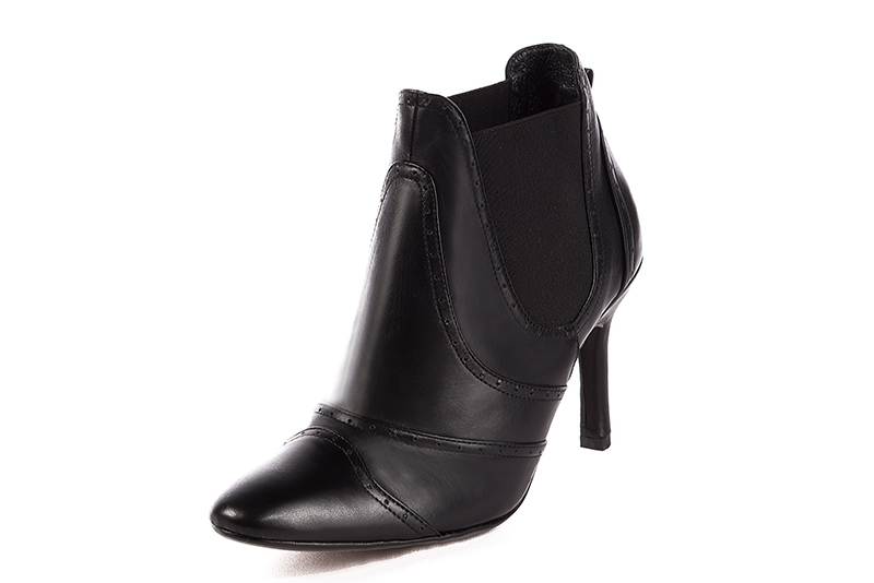 Boots élégantes et raffinées avec des élastiques sur les côtés, coloris noir. Bout rond. Talon très haut fin. Personnalisation : Choix des cuirs, des couleurs et des talons. Cou-de-pied sur mesure. - Florence KOOIJMAN