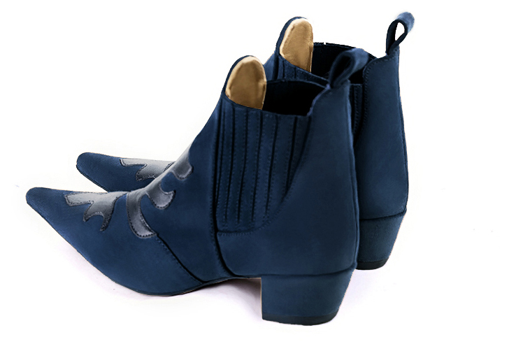 Boots femme : Boots bicolores élastiques sur les côtés couleur bleu marine. Bout pointu. Petit talon conique. Vue arrière - Florence KOOIJMAN