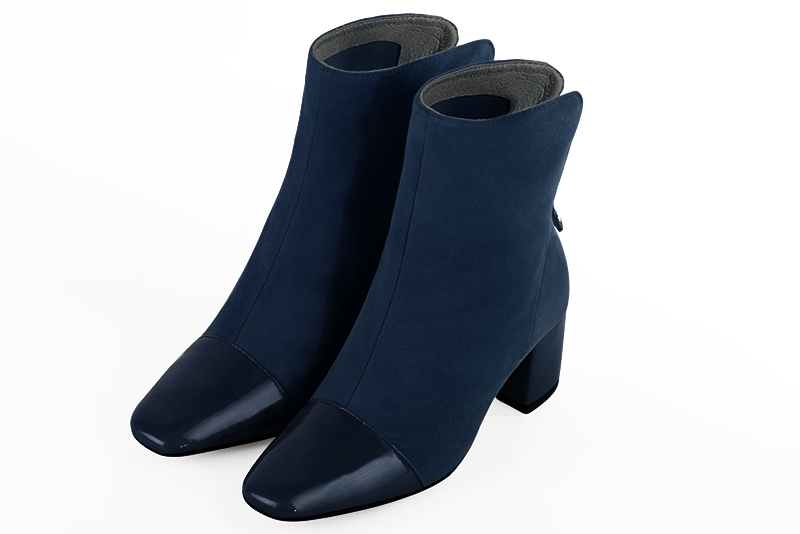 Boots femme zip : Boots luxe avec une fermeture éclair à l'arrière couleur bleu marine. Talon mi-haut à haut. Talon bottier. Bout carré - Florence KOOIJMAN